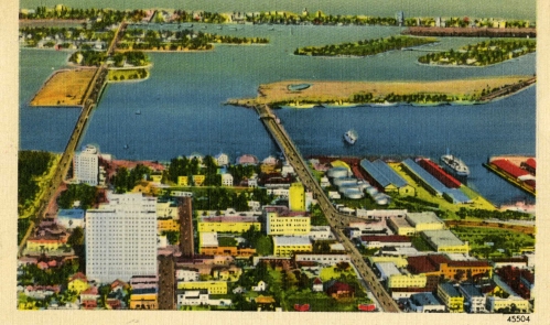 This postcard shows residences and a hotel on The Herald property